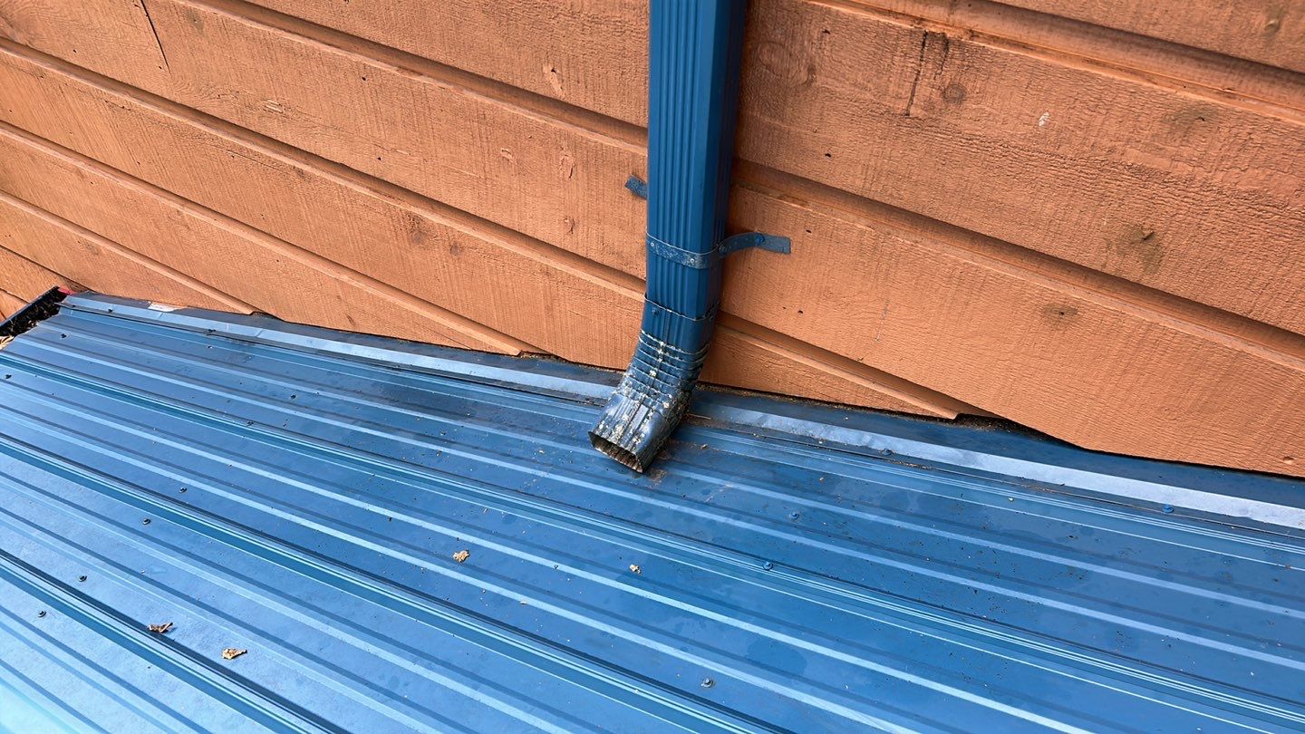 Residential Roofing Installation using Standing Seam Metal - Gallery Blue by RoofX 