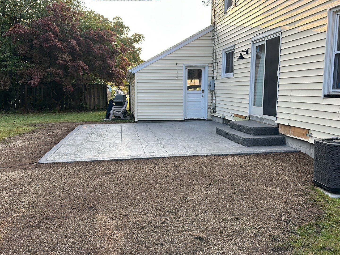 York Bluestone stamped patio by NG Masonry & Construction LLC