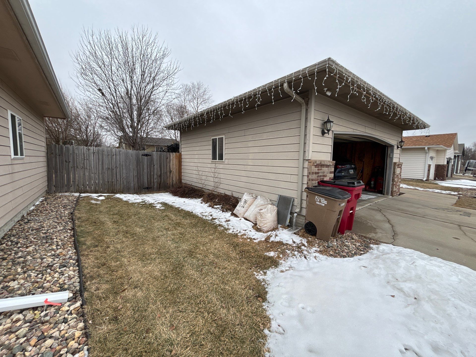 Exterior Painting and Wood Trim Replacement in Sioux Falls by Select Painting, Coatings & Garage Cabinets