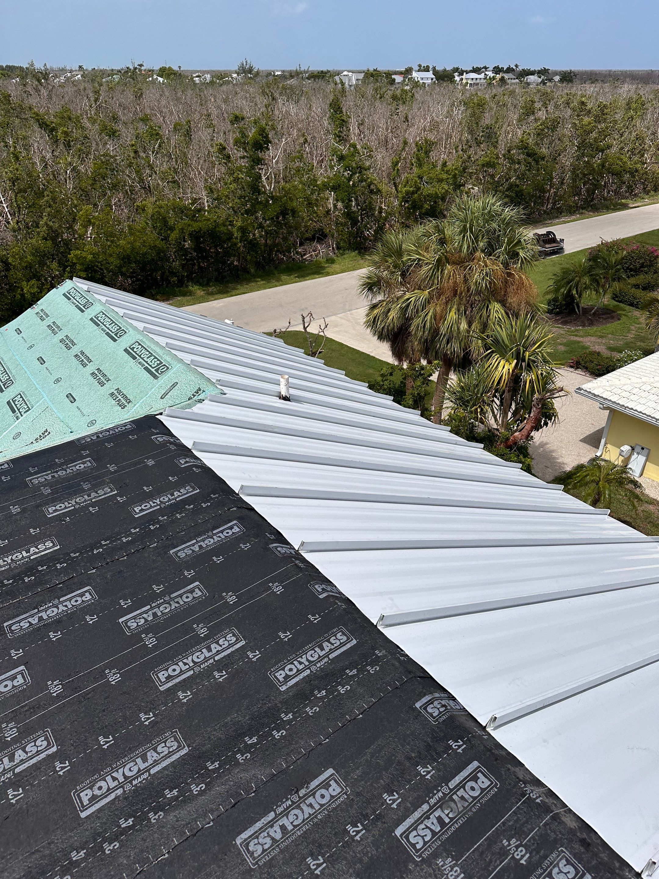 Sanibel Island Standing Seam Roof Replacement by Four Peaks Roofing