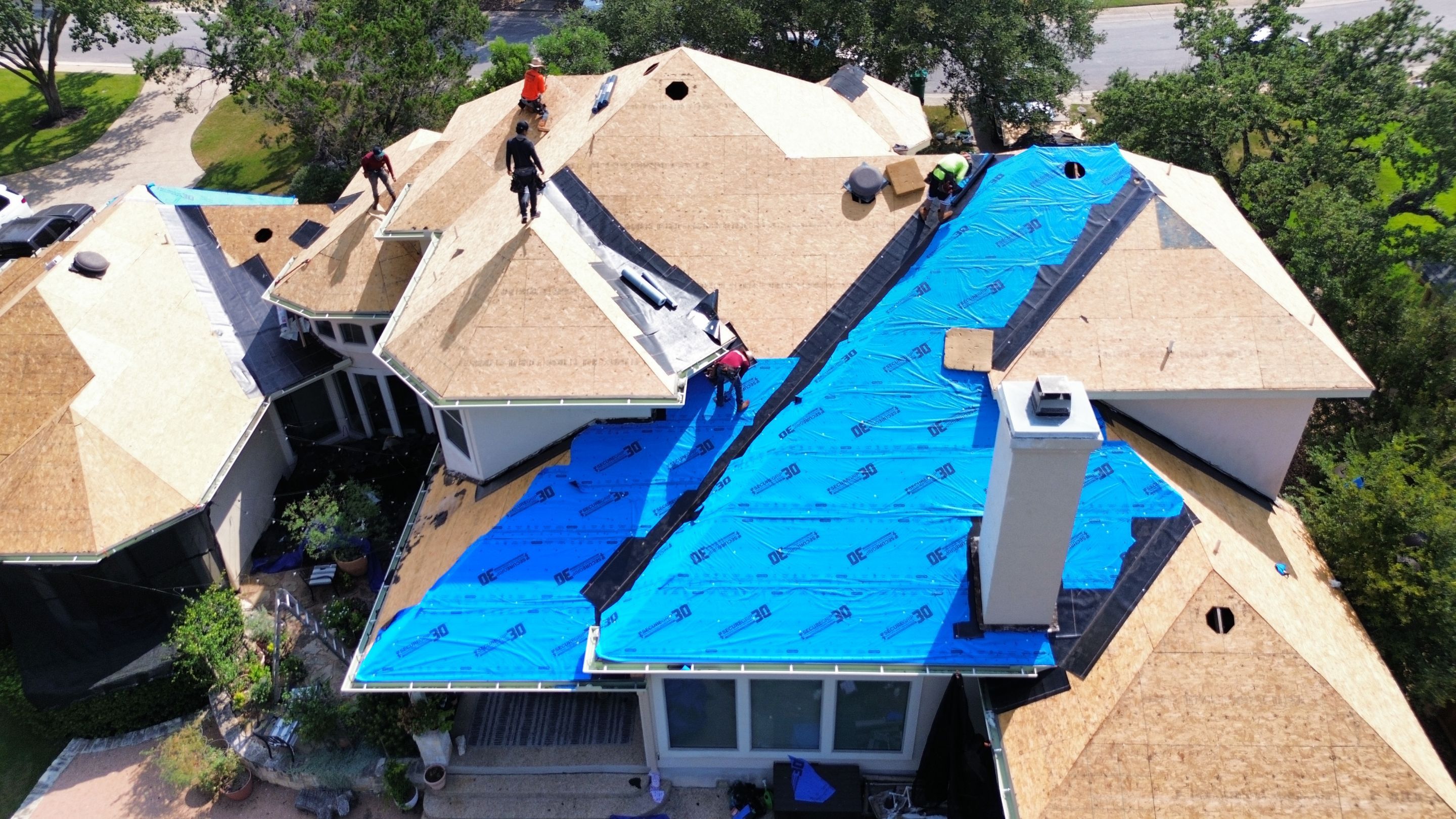 Residential Roof Replacement using 30 Year Laminate Shingles with High Profile Ridge by Premier Roofing and Contracting