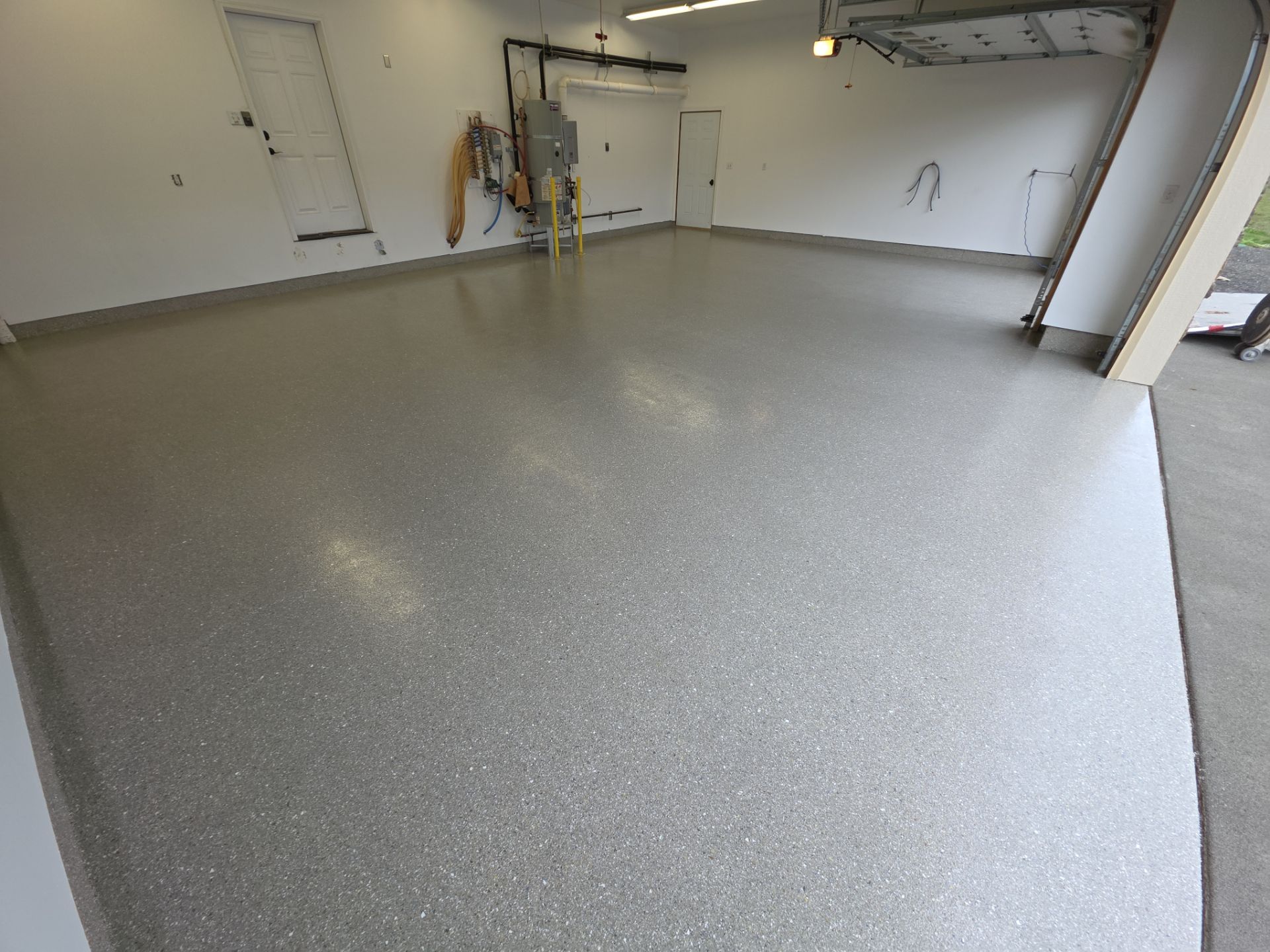 Travertine Hybrid Garage Floor Coating and Crack Repair in Spokane by Croc Coatings, LLC