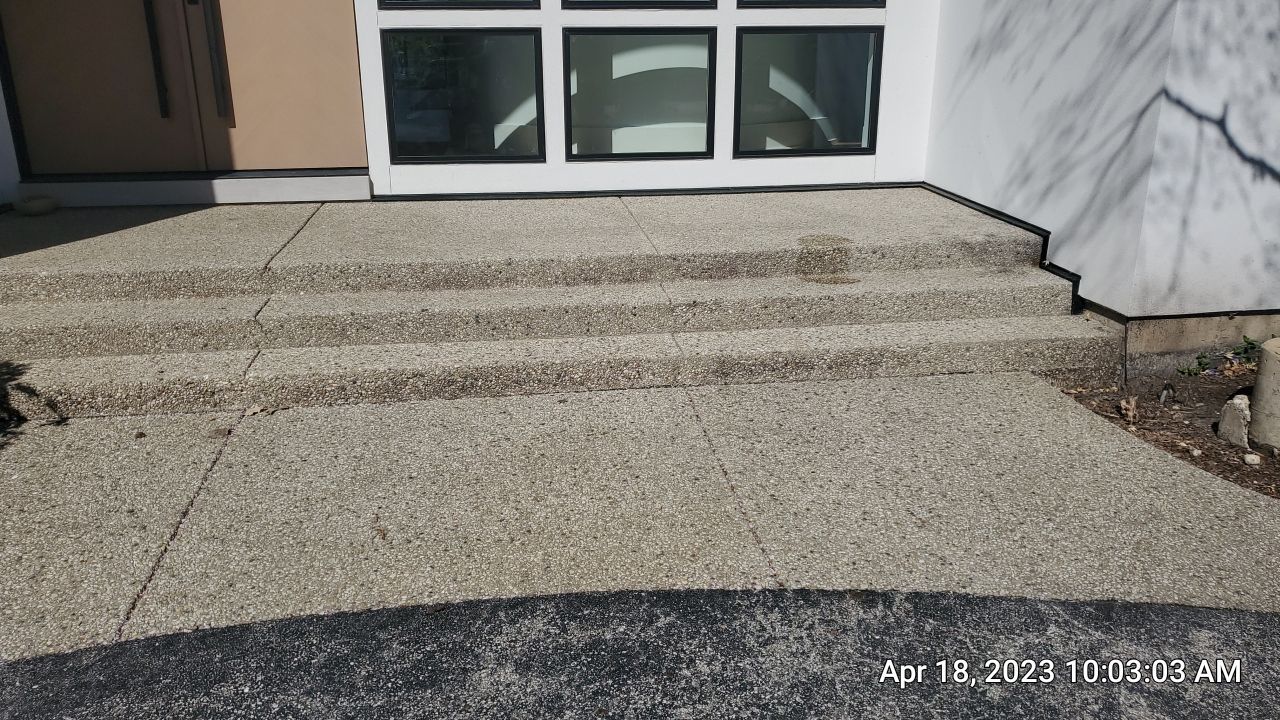 Aggregate concrete cleaning and sealing using Surebond SB-9000 by Northern Power Washing LLC.