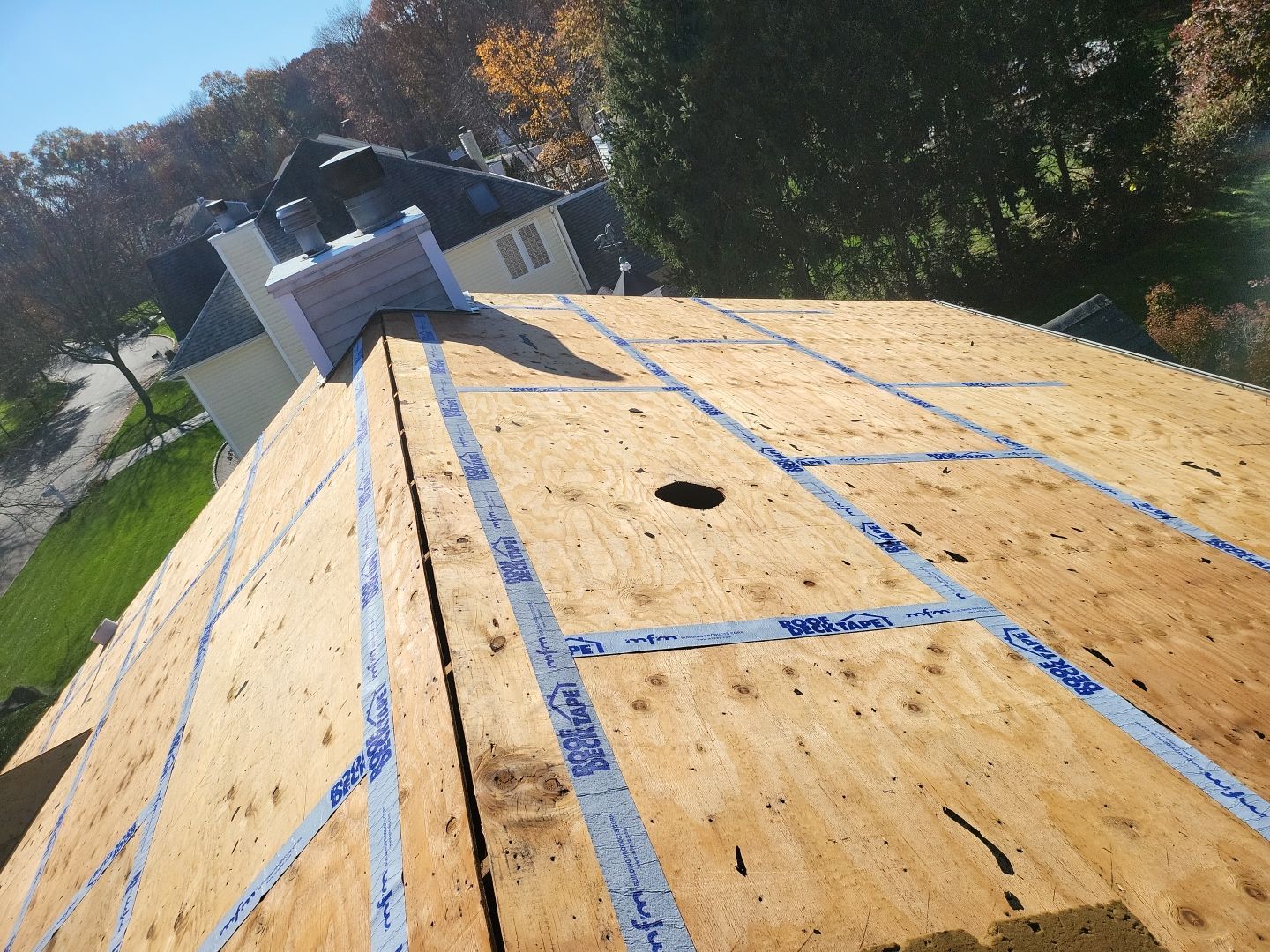 Residential Roofing Installation using Certainteed Landmark Moire Black by A Plus Exterior