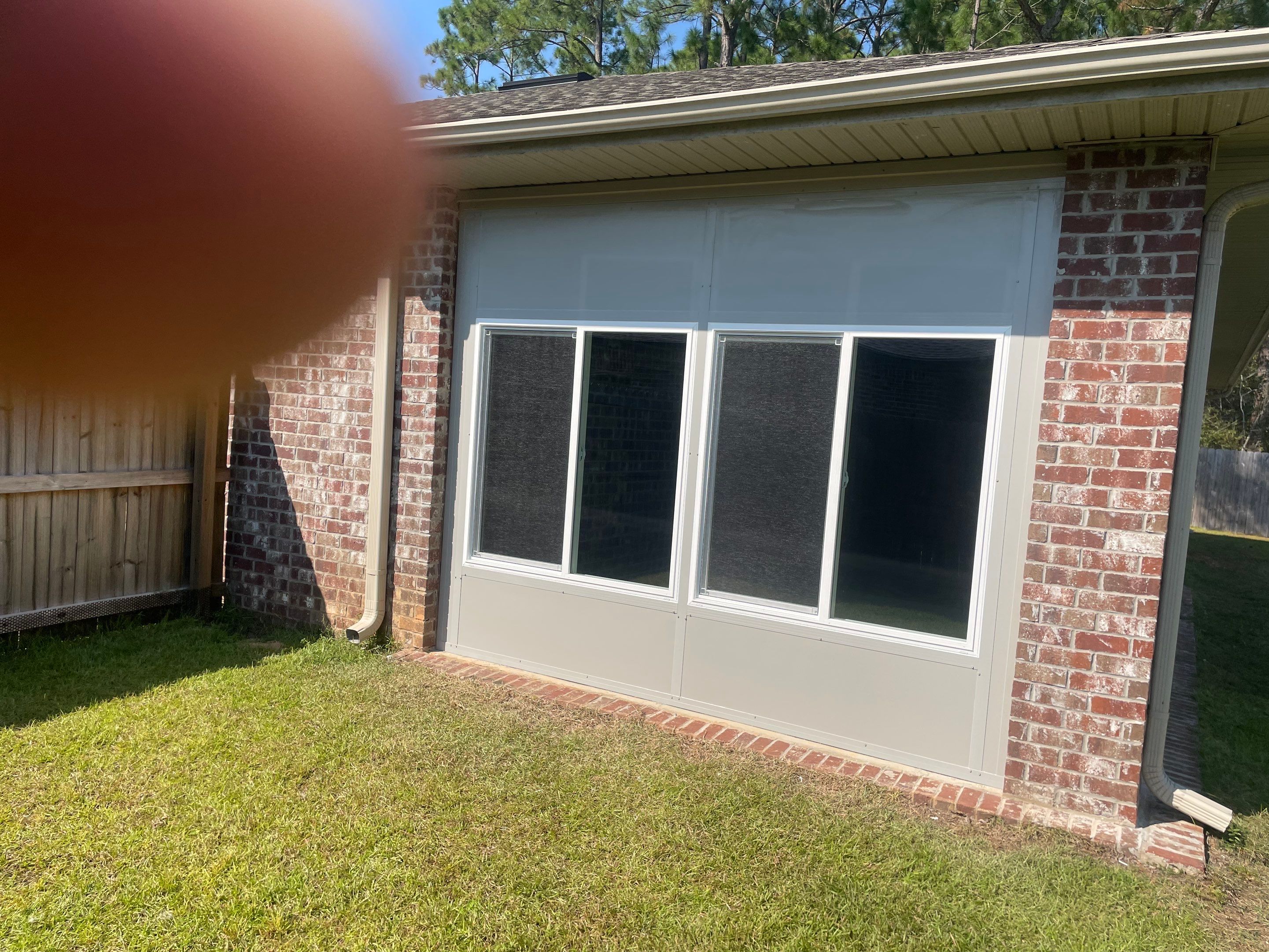 Glass Room Under Existing Patio Cover by Titan Sunrooms