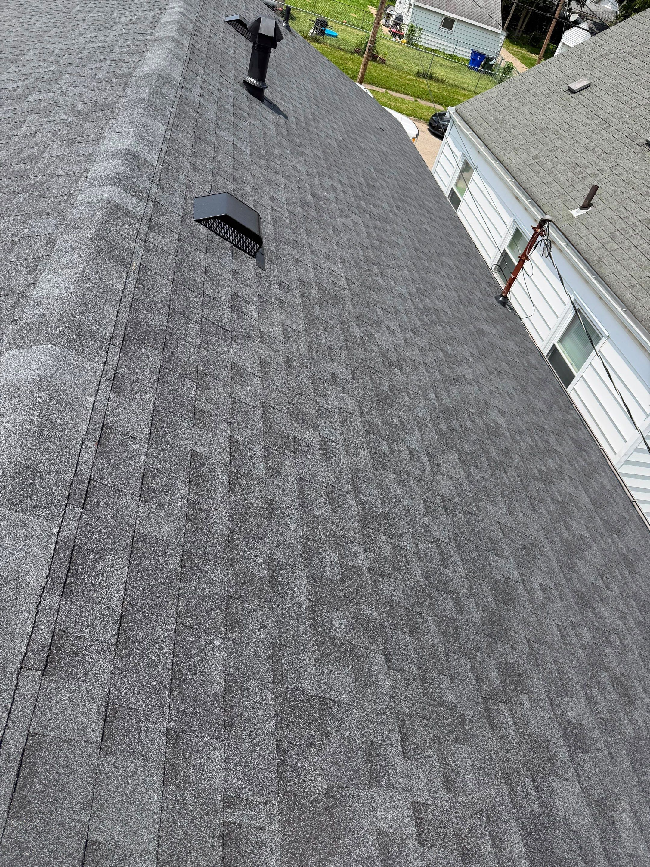 Residential Roof Replacement and Vinyl Siding Installation in Hamilton by XPRO ELITE LLC