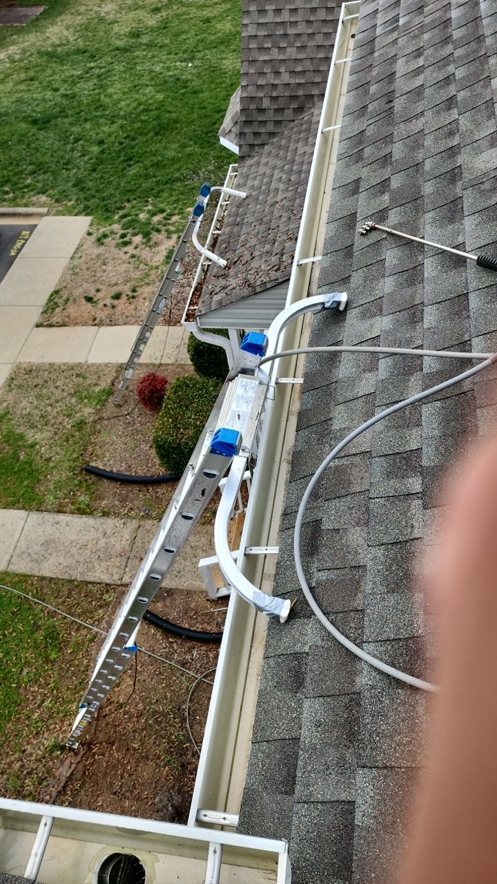 Gutter Cleaning using water by Power Wash Masters LLC