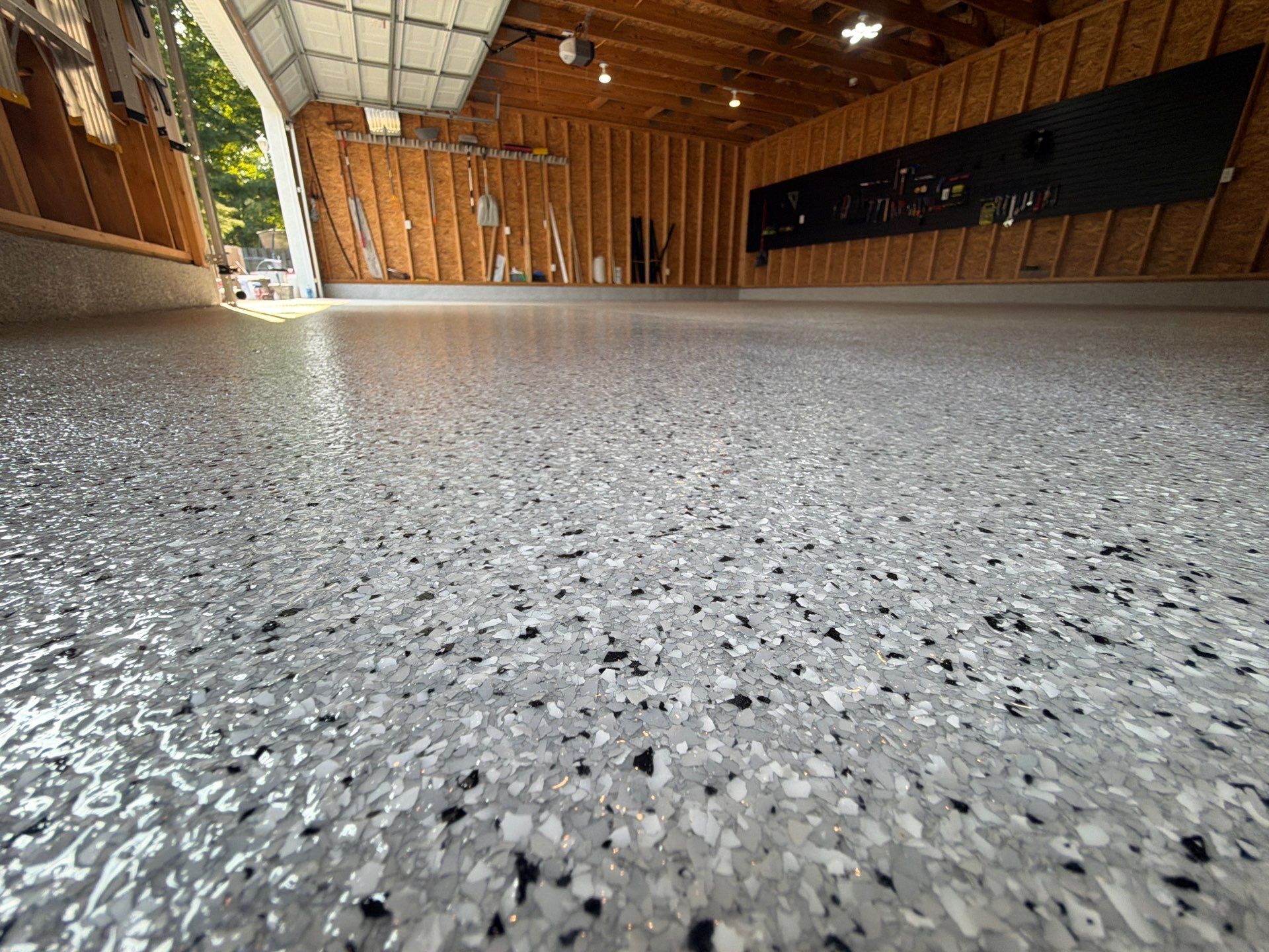 Custom Epoxy Flake Garage Floor Installation in Norton Shores by Gordon Painting