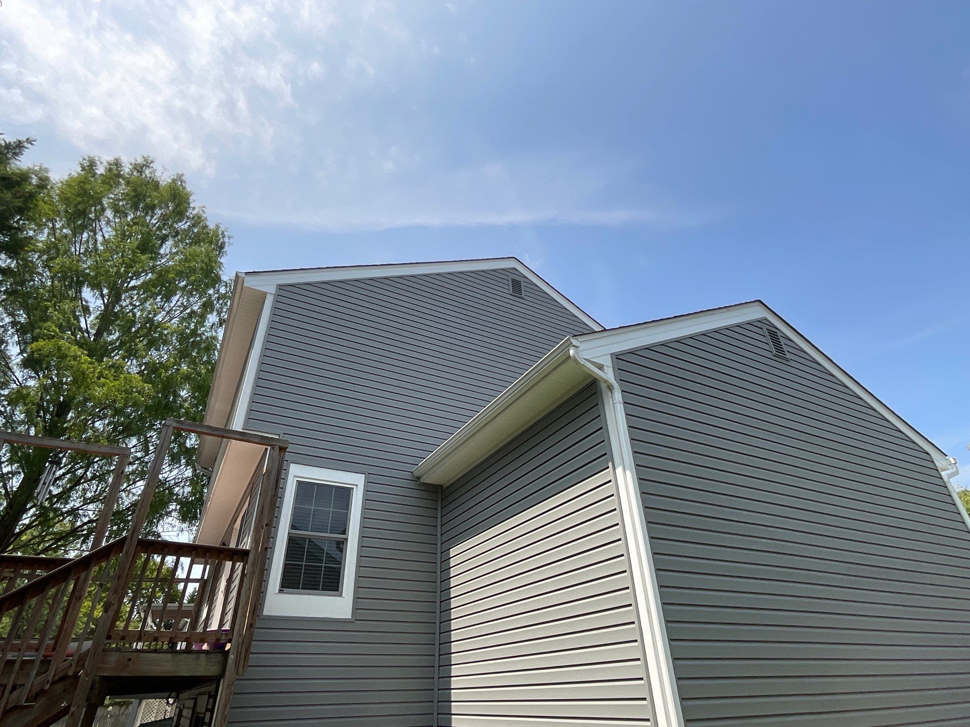 New Prodigy siding with One-piece insulated siding system & Exterior painting   by Alpha Design Services