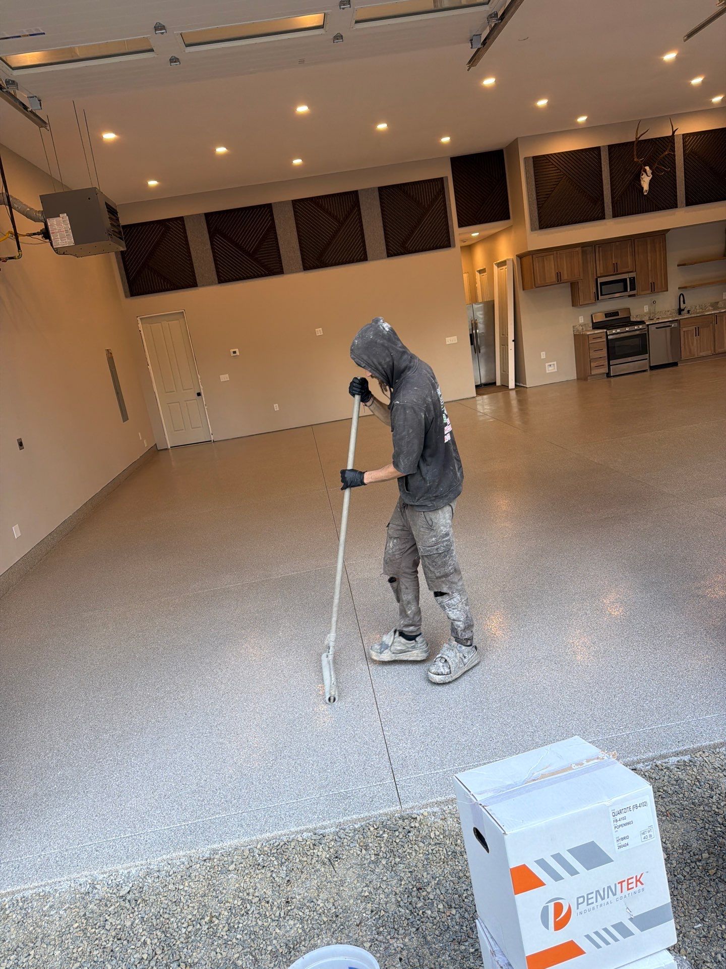 Quartzite Hybrid Garage Floor Coating Installation in Coolin, Idaho by Croc Coatings, LLC
