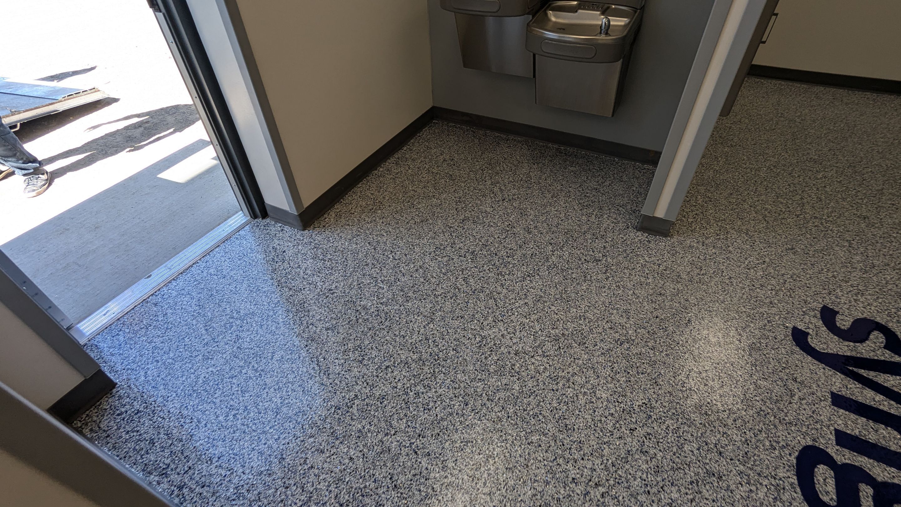 Commercial Floor Transformation using Aurora Accent W/Hypnotic Blue by Croc Coatings, LLC