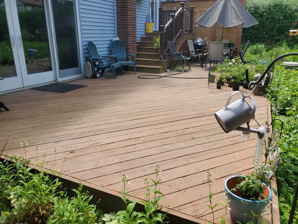 wood deck cleaning, and staining by Northern Power Washing LLC.