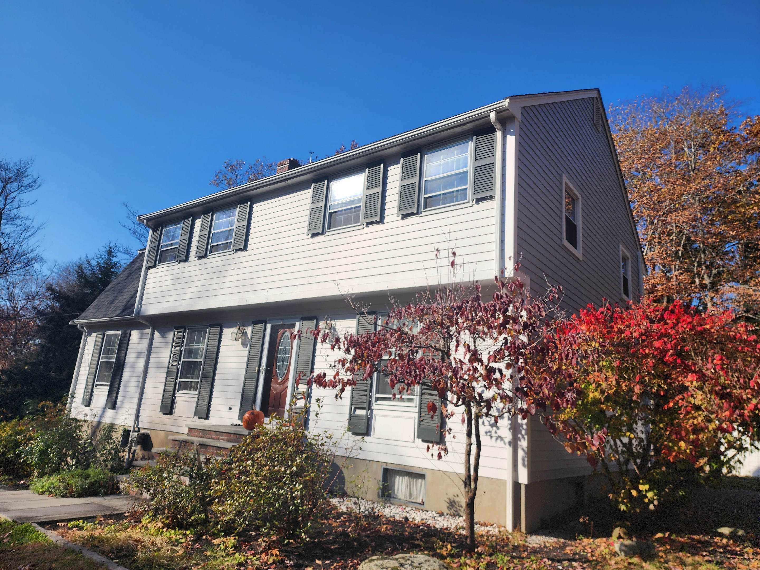Custom window trim work and siding replacement in Dover, MA by UBrothers Construction