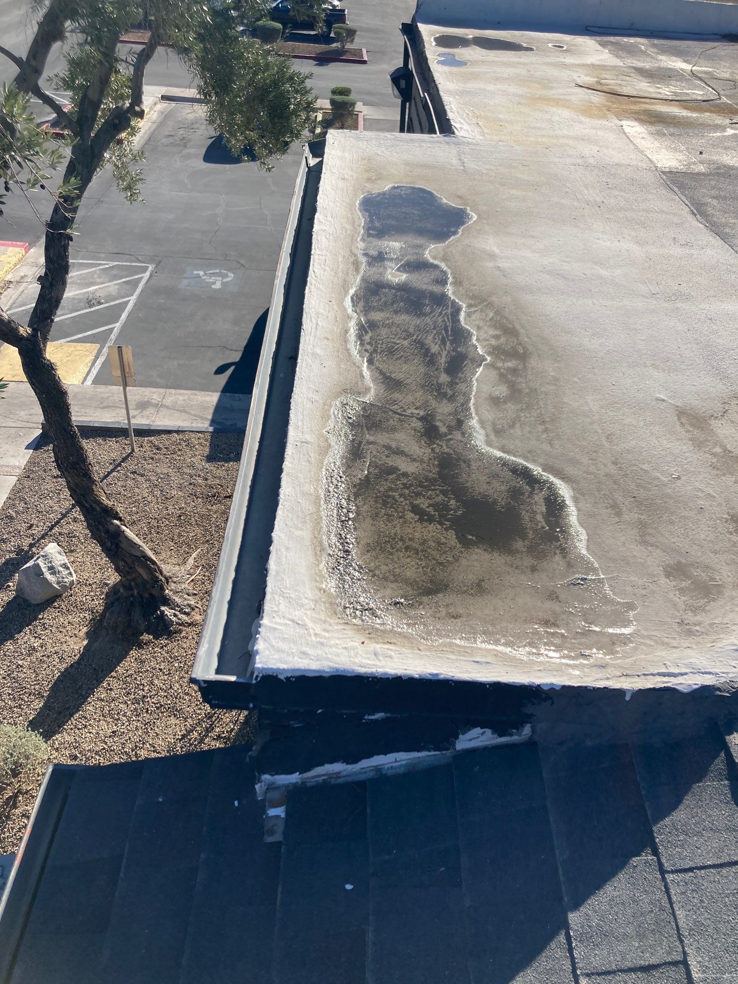 Commercial gutter cleaning North Las Vegas before photo with filled gutters