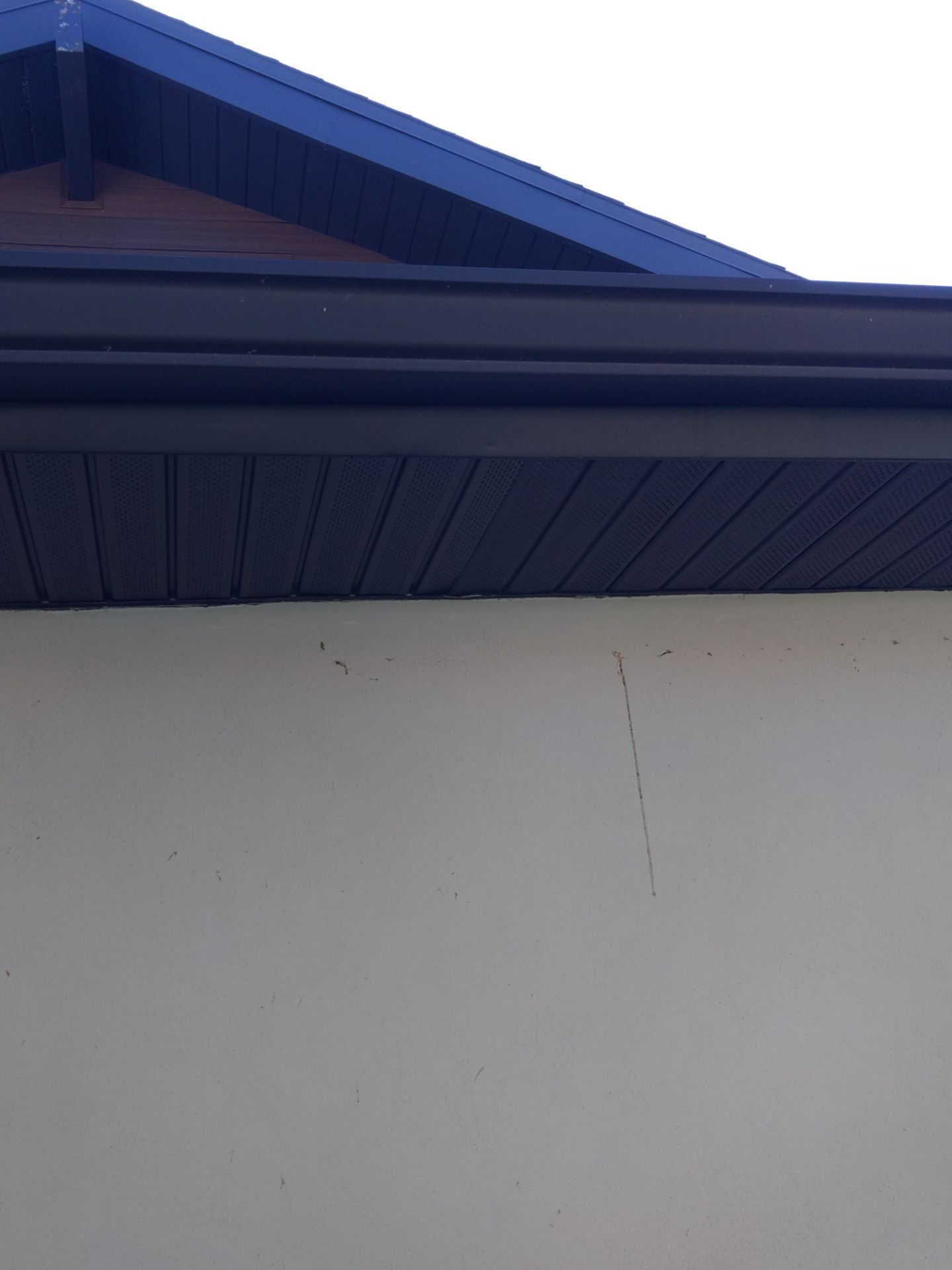 Dark Bronze Soffit Installation in Sarasota FL by Gutter Professors