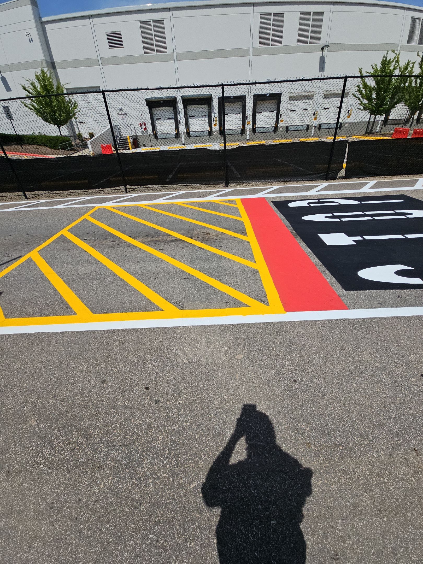 Striping Amazon Parking Lot  by Billy Weatherspoon Contractor
