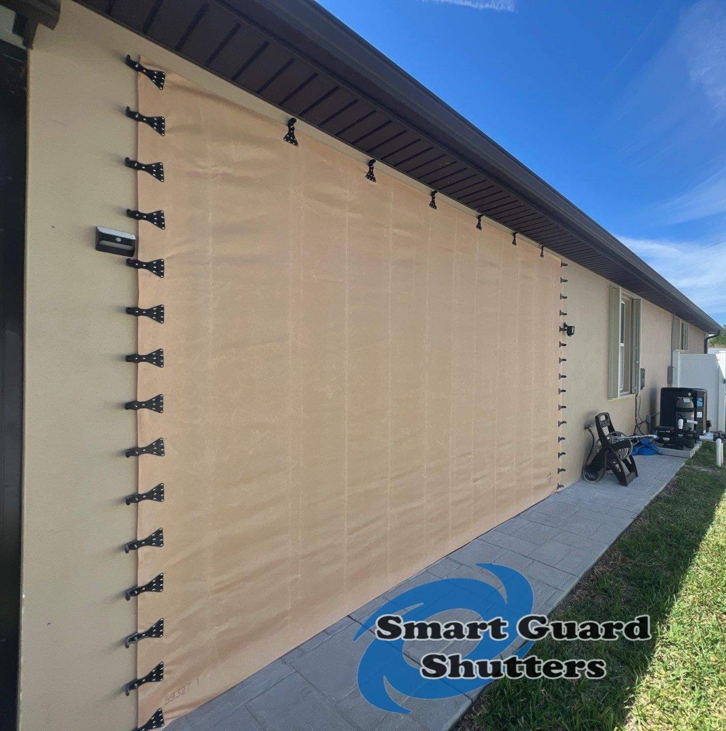 Hurricane Protection in Tan / Ivory by Smart Guard Shutters