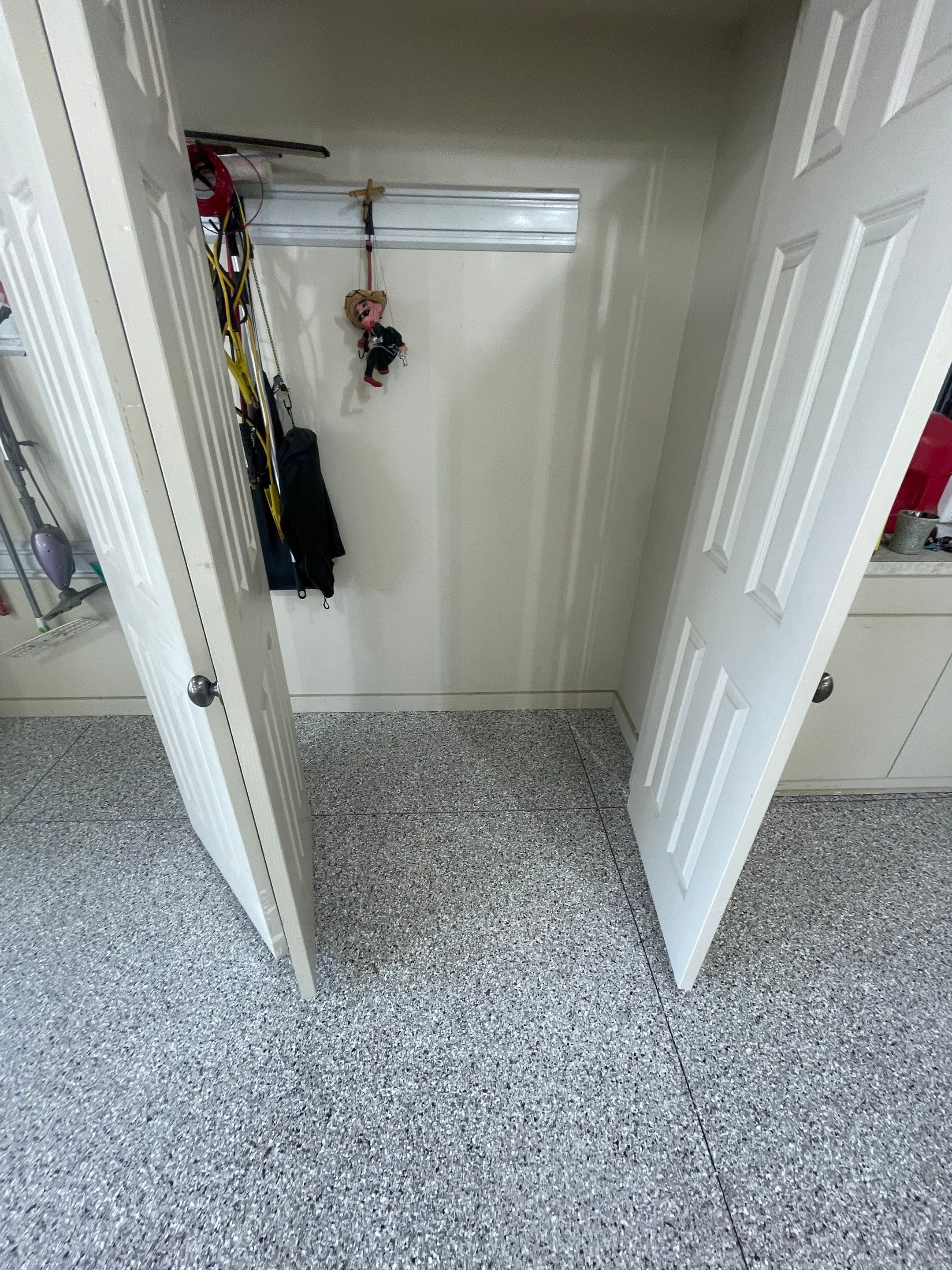 Coyote Flake Garage Floor Coating in Sioux Falls with Trench Drain by Select Painting, Coatings & Garage Cabinets