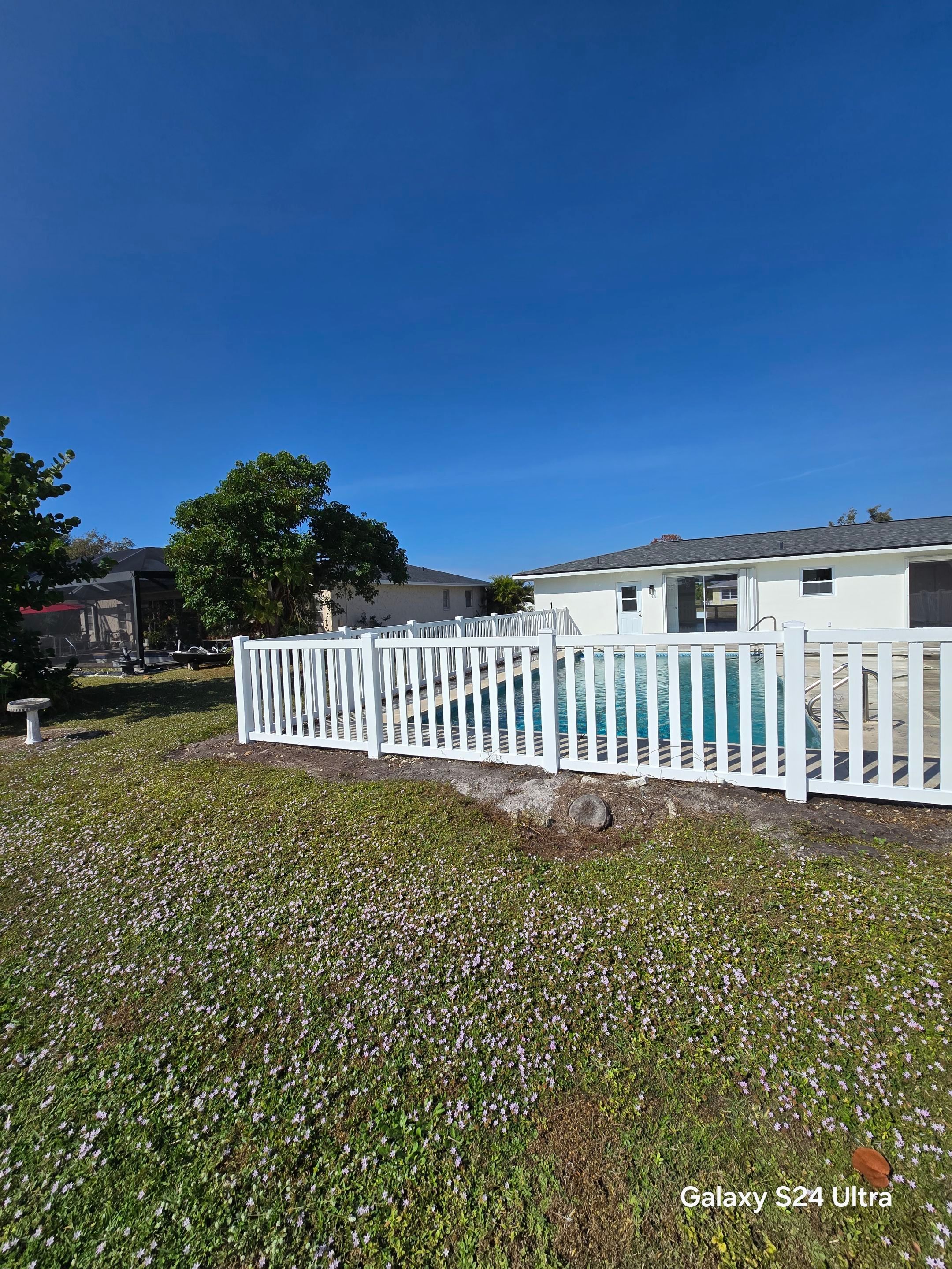 Vinyl Picket Fence for Pool in Port Charlotte by True Fence LLC