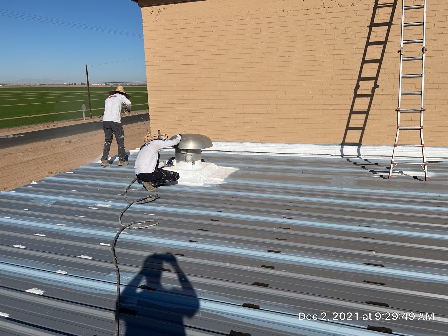 Metal roof restoration on commercial roof using Conklin Benchmark/PUMA XL fabric and coating by Straight Edge Roofing Inc