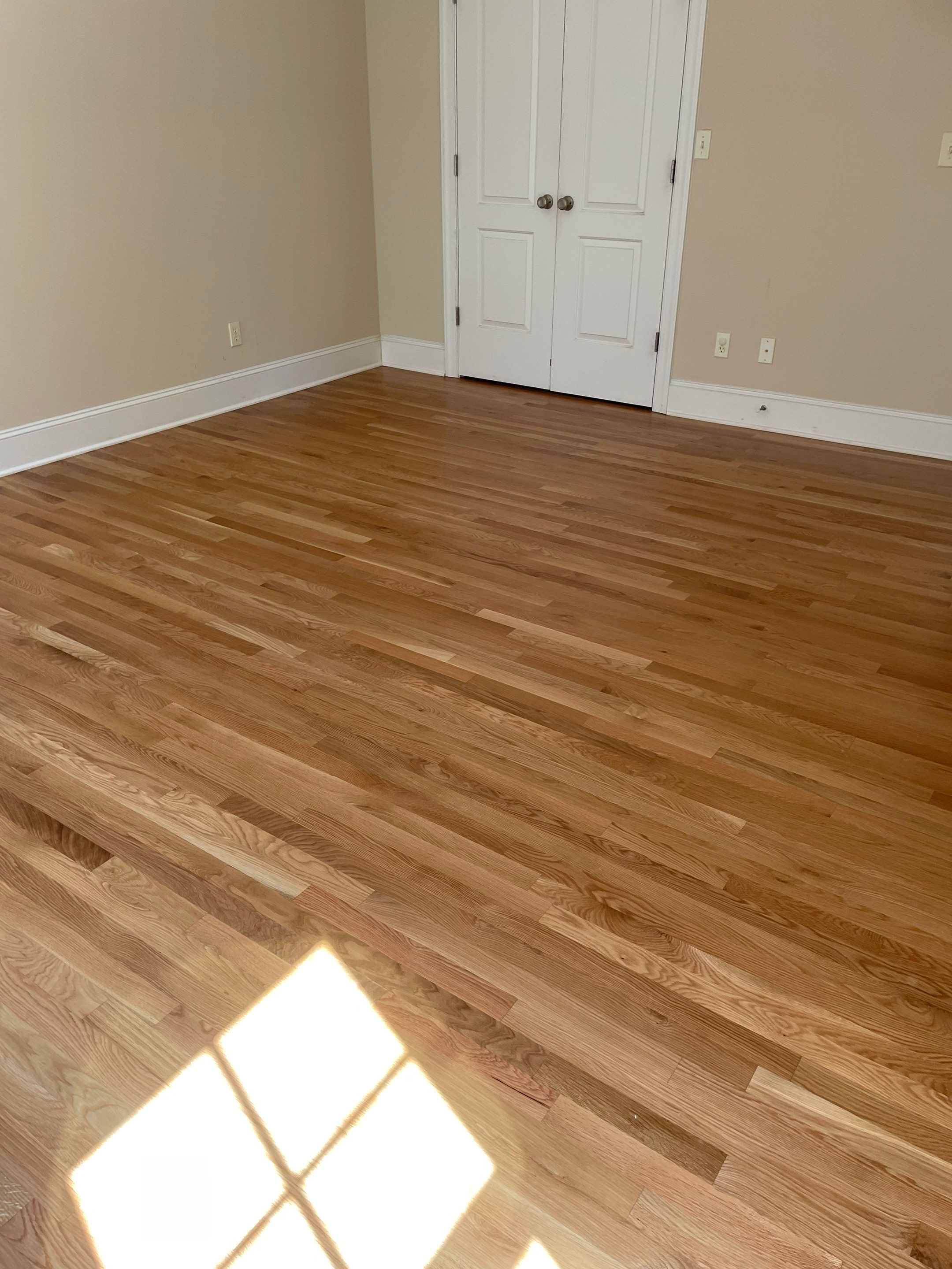 Simple bedroom installation by Accent Custom Floors