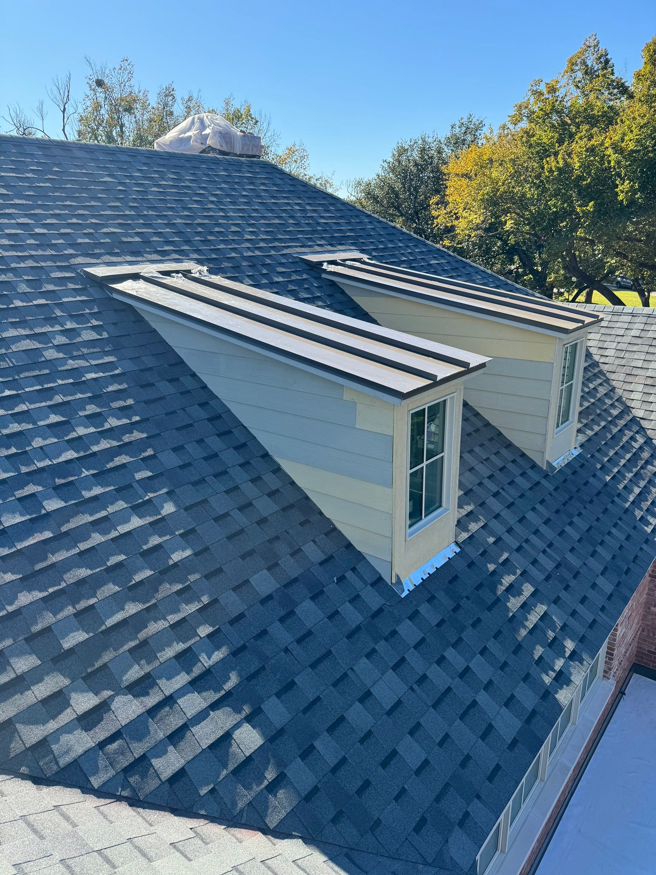Residential Roofing Installation using ATLAS Signature Select Roof System by Harvey Roofing & Construction