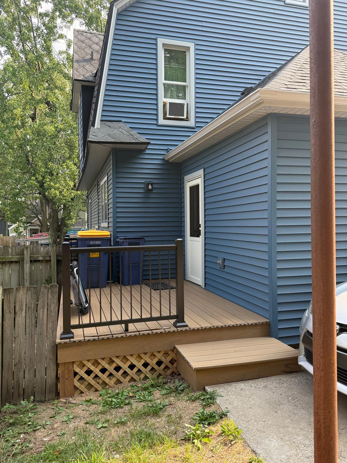 SIDING, DECK AND NEW PORCH  by Avalon Roofing and Exteriors