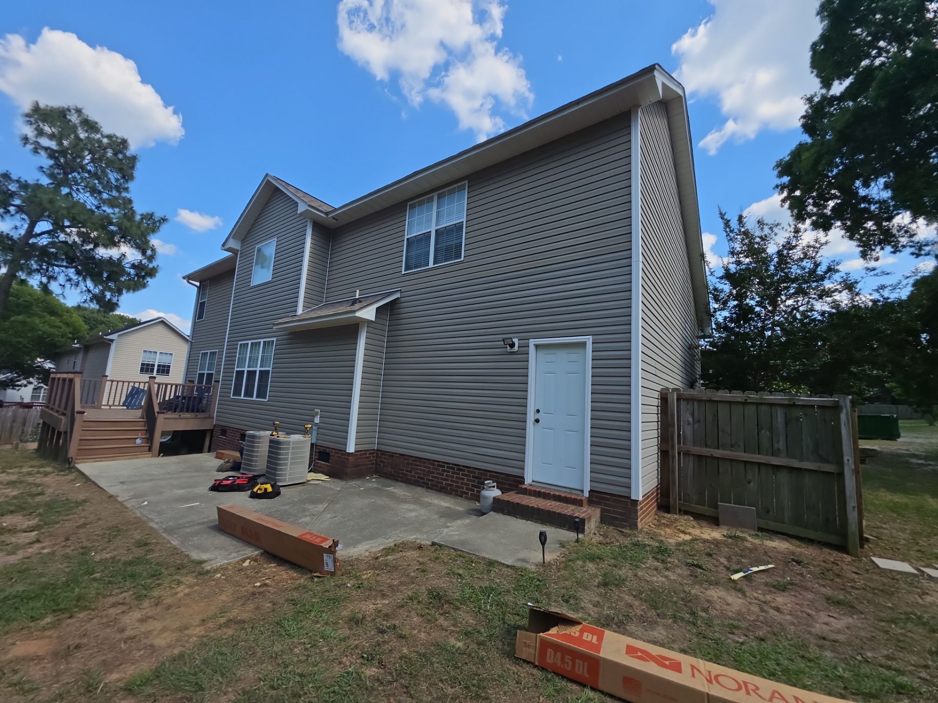 Vinyl Siding and Trim Replacement for Two-Story Sanford Home by The Remodeling Company