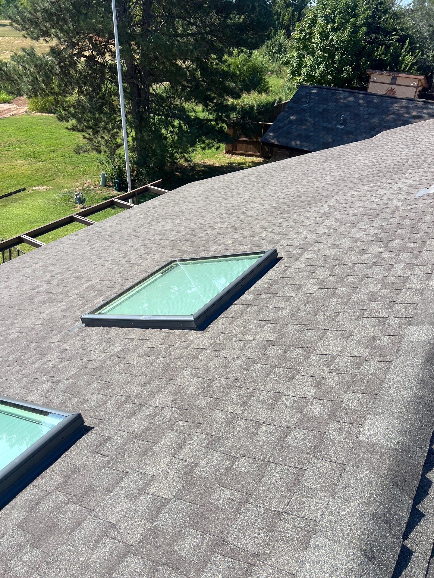 Roof Replacement and Skylight Replacement in Yukon by McCann's Roofing and Construction