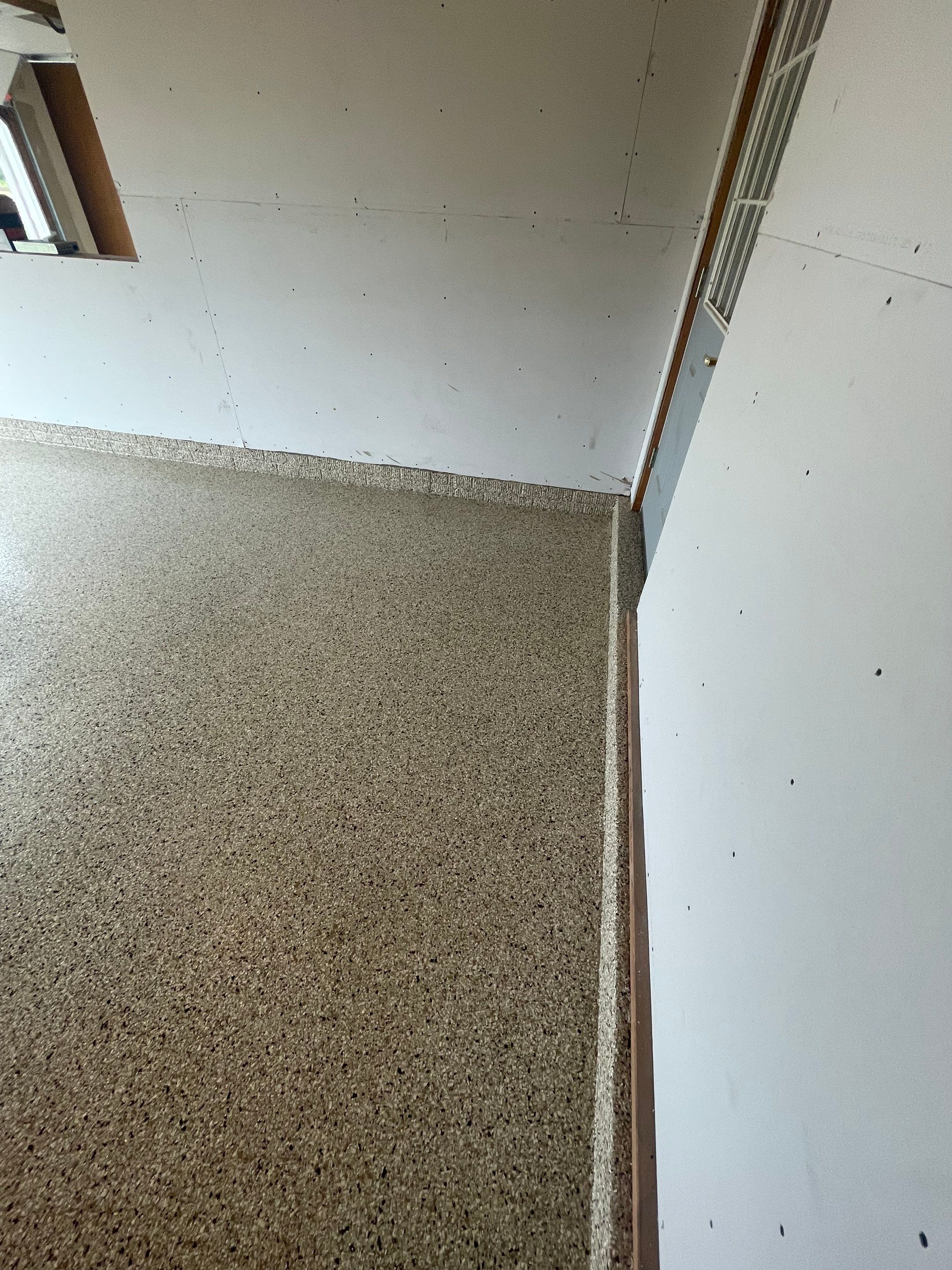 Speckled Epoxy Floor Coating Installation for Centerville Residential Garage by Select Painting, Coatings & Garage Cabinets