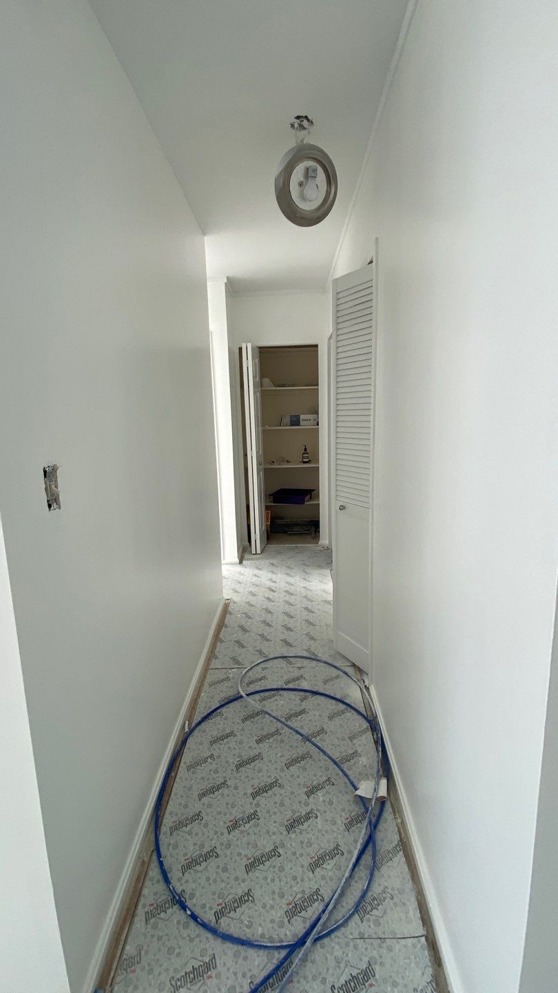 Apartament renovation  using Harwood floor  by Jesus Master Handyman LLC 