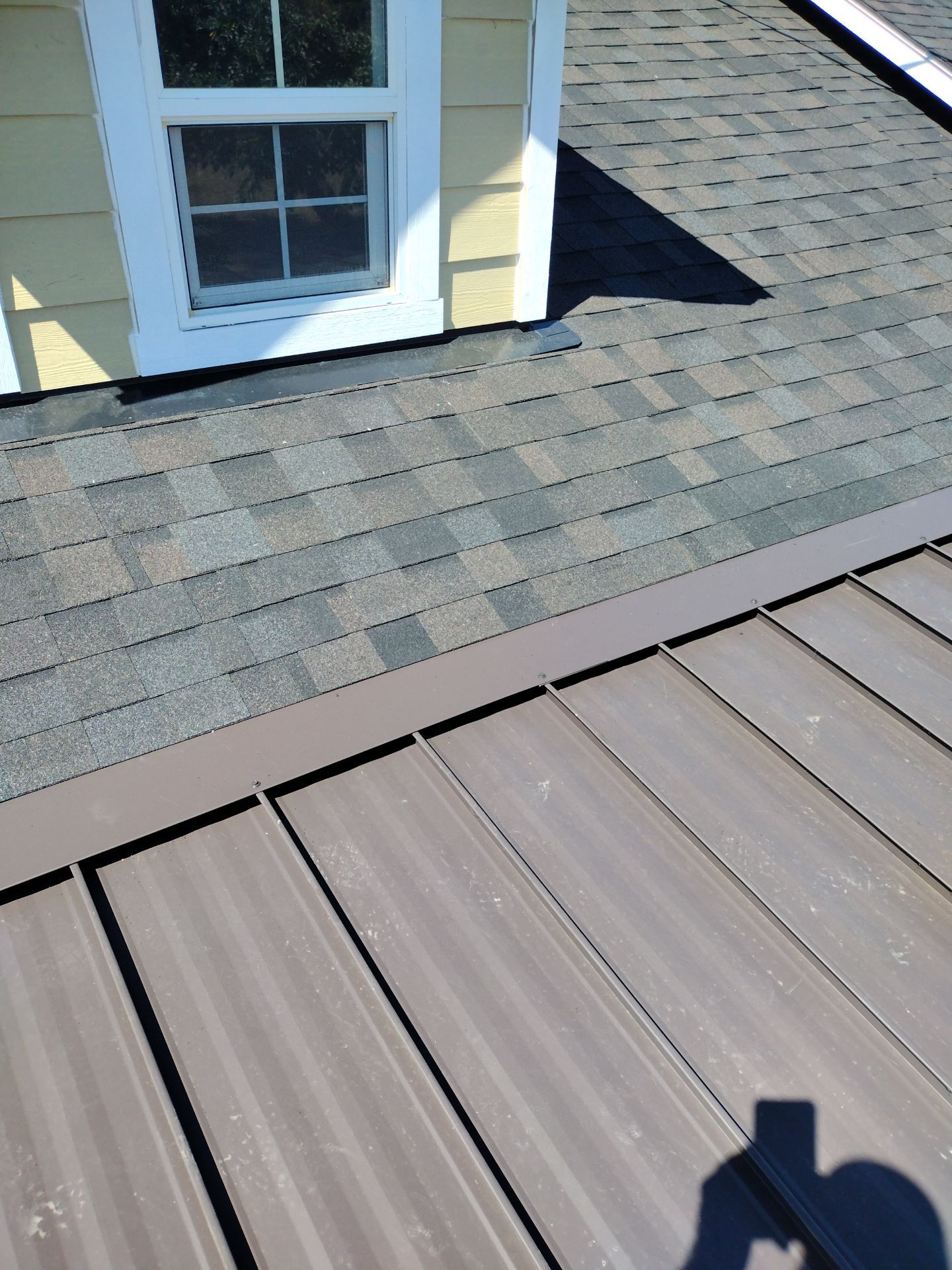 Residential Roof Replacement with Metal Accents by Orezona Building & Roofing Company, Inc.