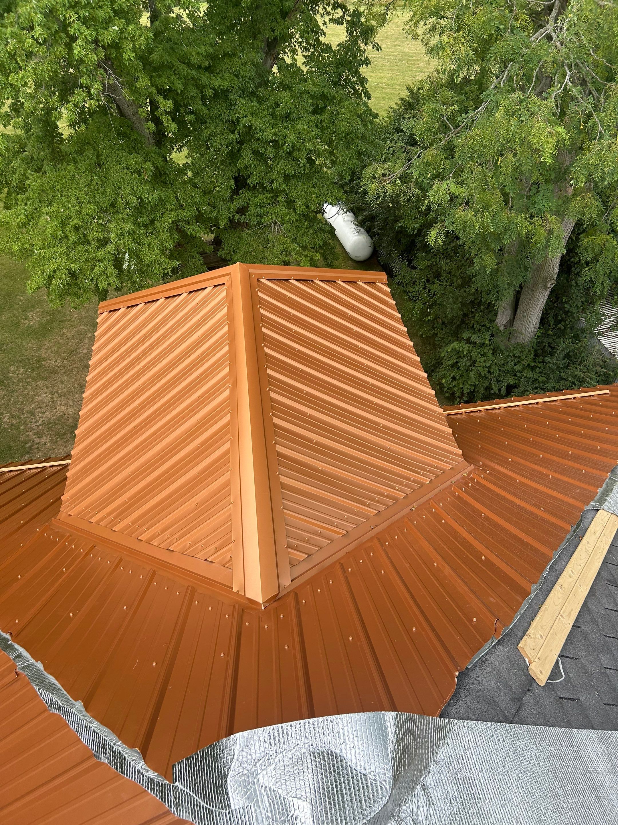 Residential Roofing Installation using Performance Panel Metal - Copper Metallic by RoofX 