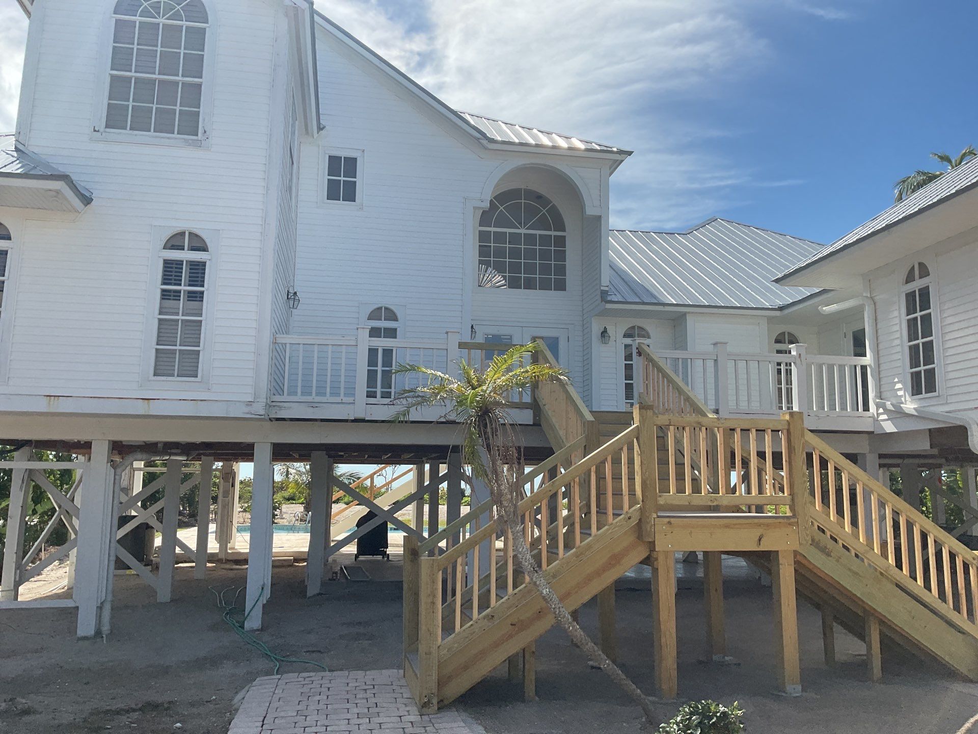 Downspout Installation using Downspout Extension in Sanibel FL by Gutter Professors