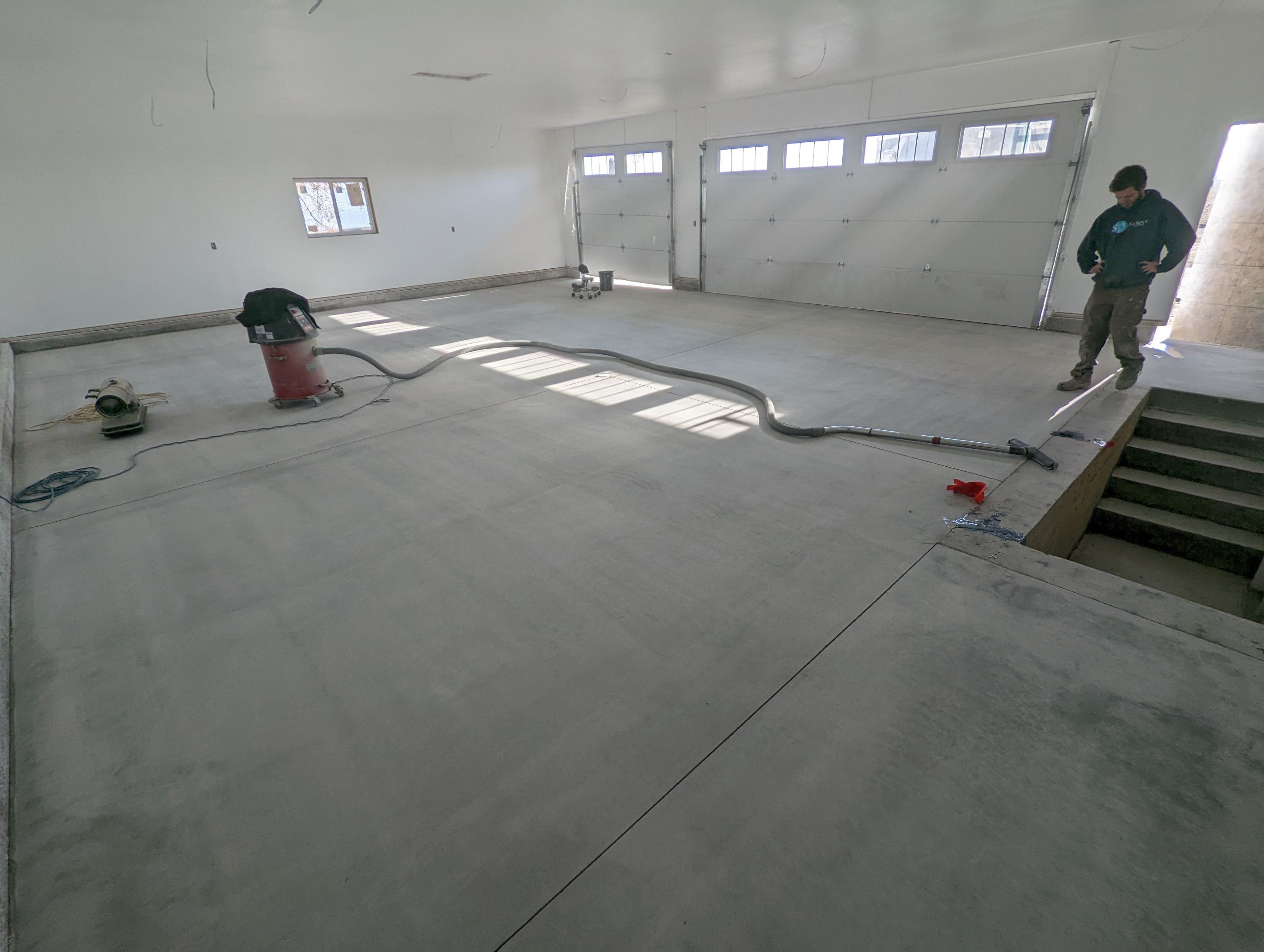 Garage using Domino  by Select Painting, Coatings & Garage Cabinets