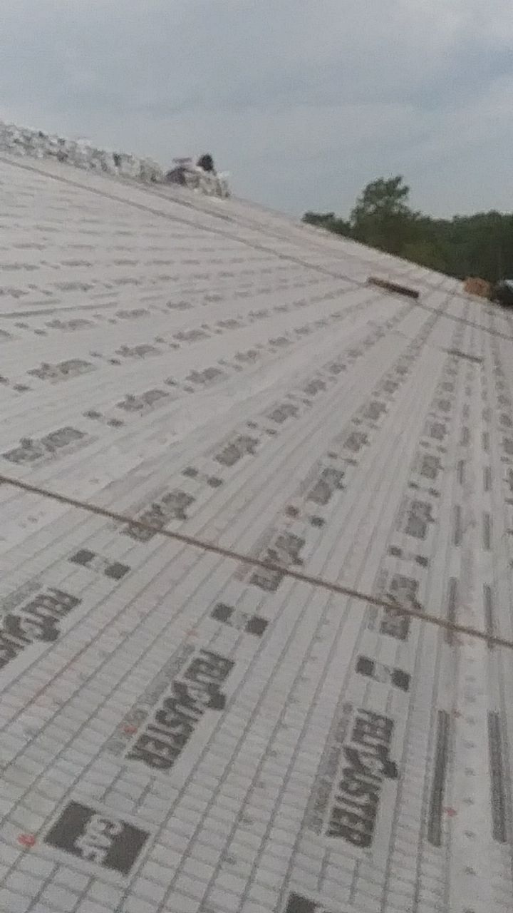 Residential Roofing Installation using Roof Replacement by American Roofing & Construction LLC