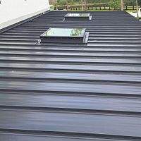 24ga 1.5" Mechanical Seam Matte Black by Total Roofing System The Metal Roof Experts