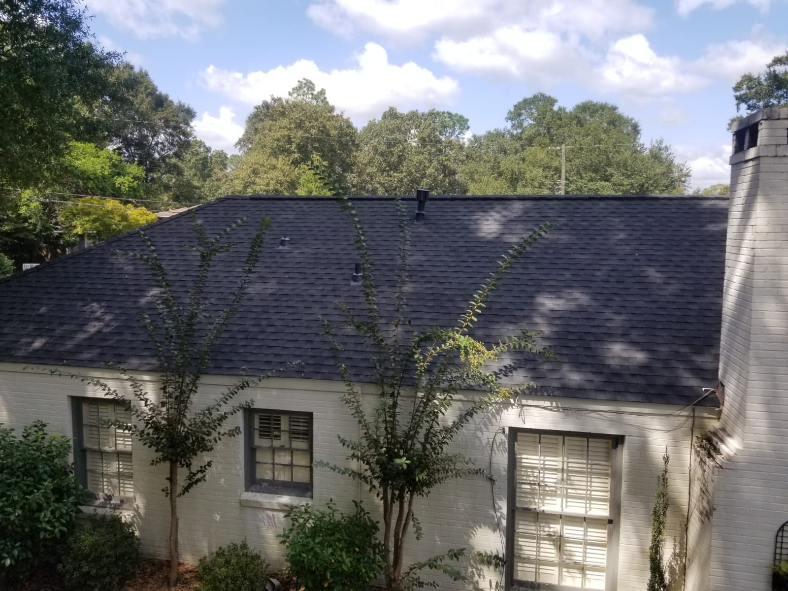 Residential Roofing Installation using Roof Replacement by American Roofing & Construction LLC