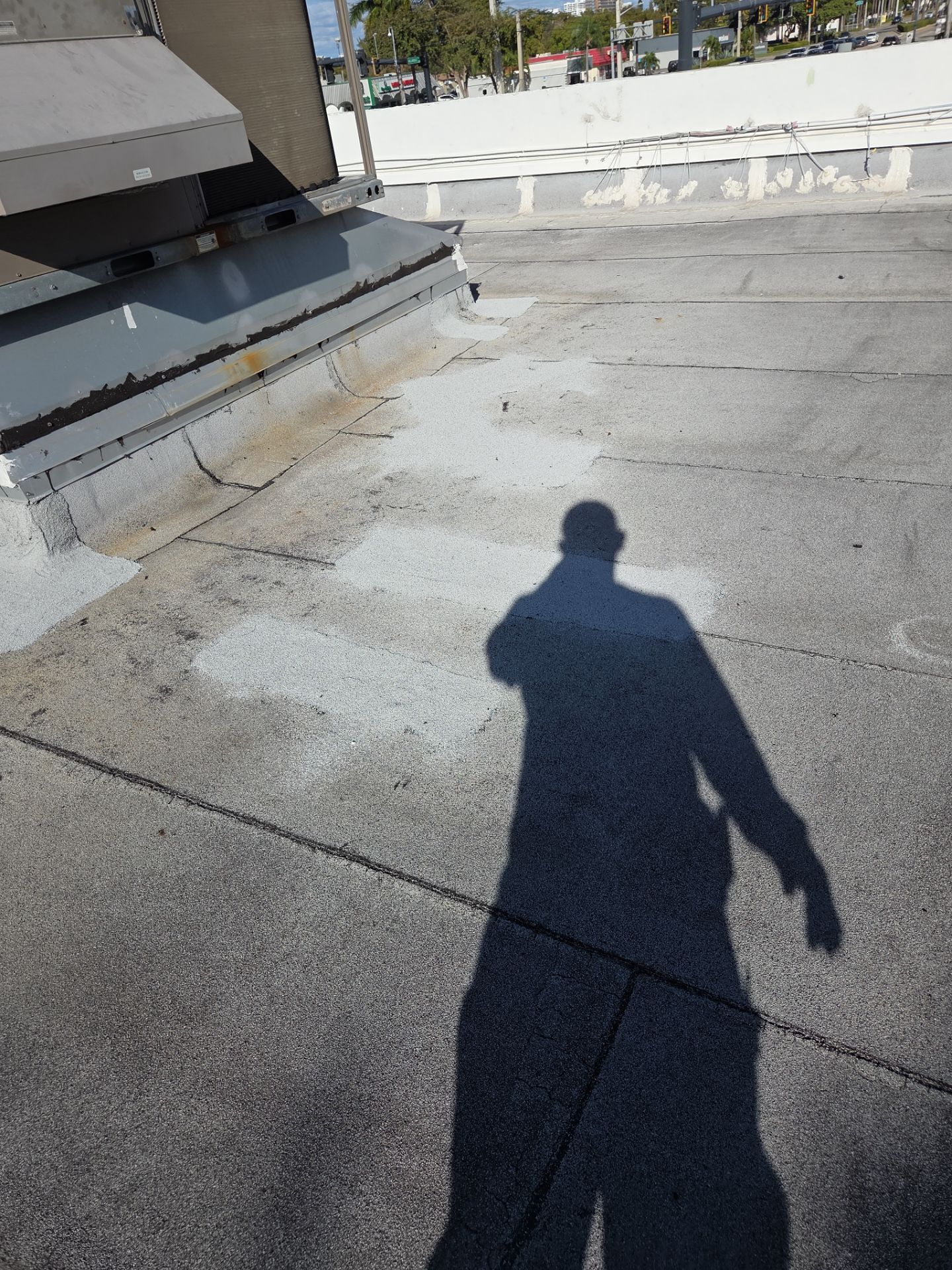 Commercial Flat Roof Restoration Using Silicone Coating in Hallandale Beach by Aastro Roofing