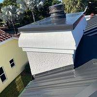 24ga 1.5" Mechanical Seam Matte Black by Total Roofing System The Metal Roof Experts
