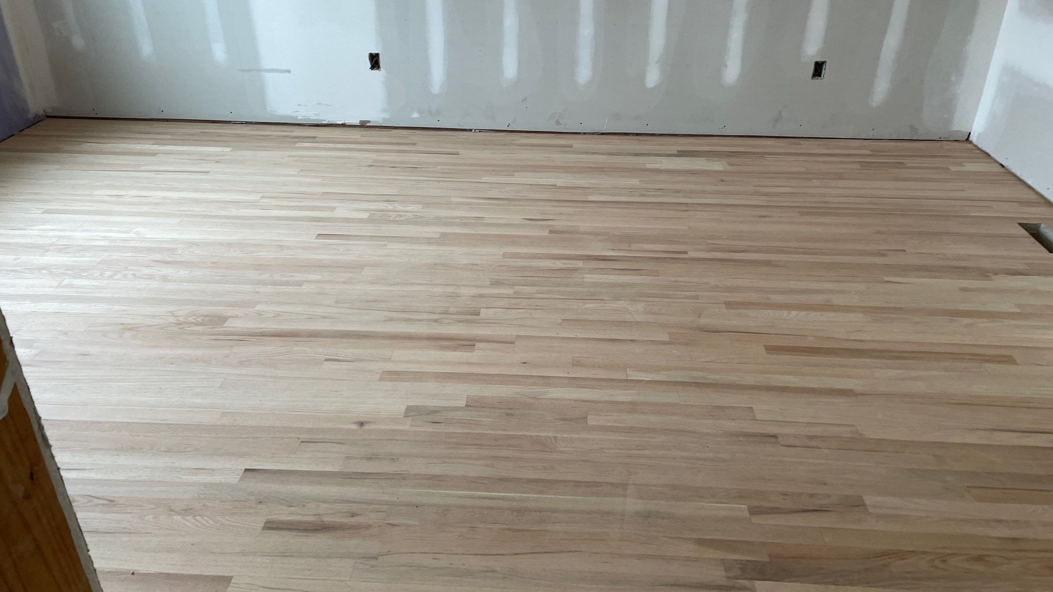 Remodeled Home with new tile floors, Showers and Refinished Oak Floors with stain and Waterbased Finish by Footprints Floors of Coastal Carolina