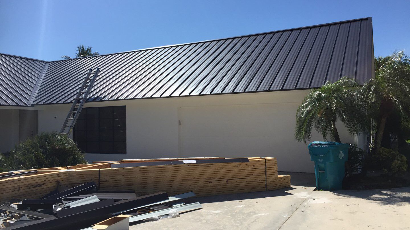 Residential Roofing Installation using 1" Nail strip metal roof by BLUES BROTHERS ROOFING