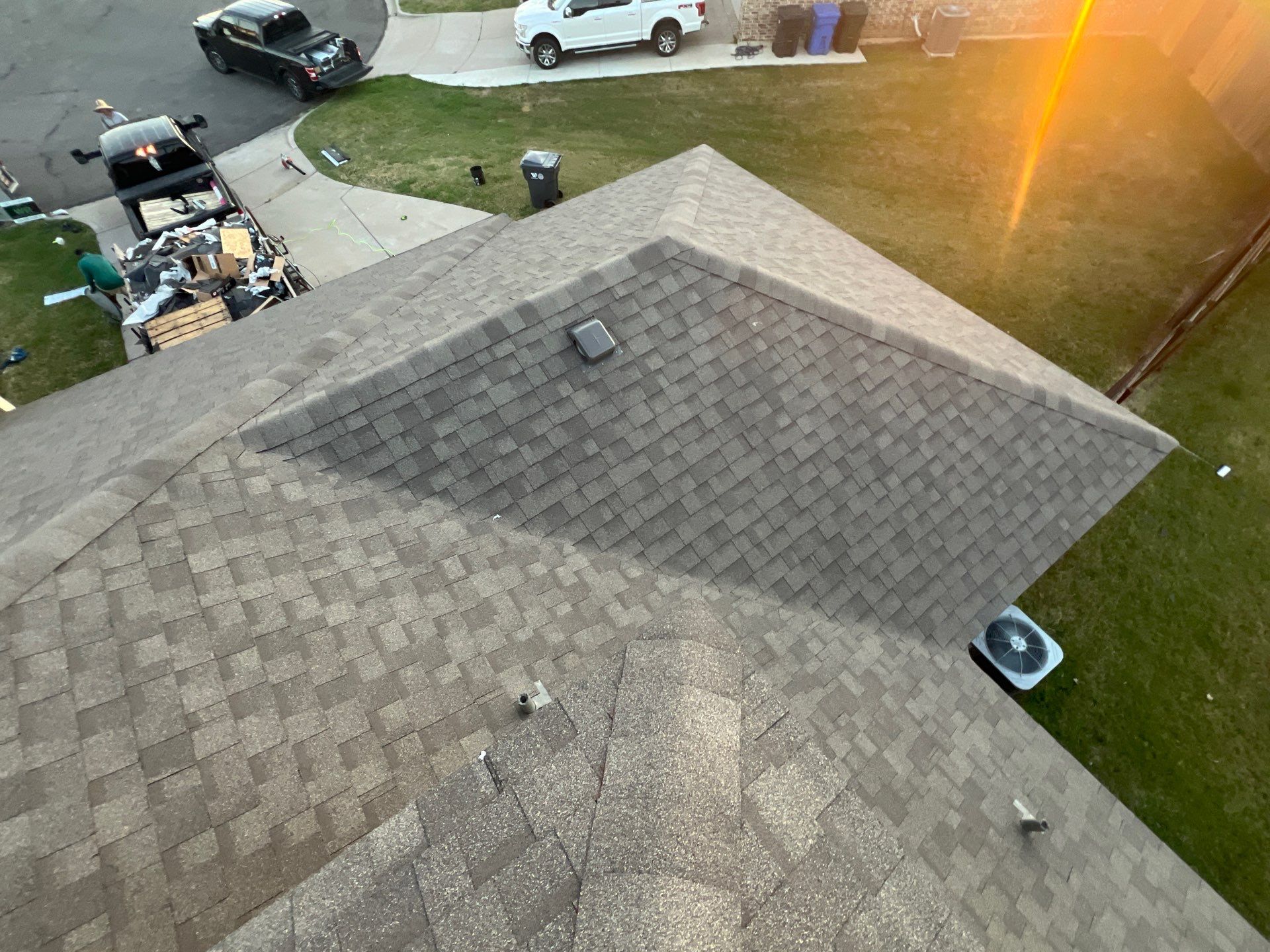 Residential Roofing Installation using IKO Cambridge 30yr Architectural Shingles. Color: Weatherwood by WR Roofing Solutions