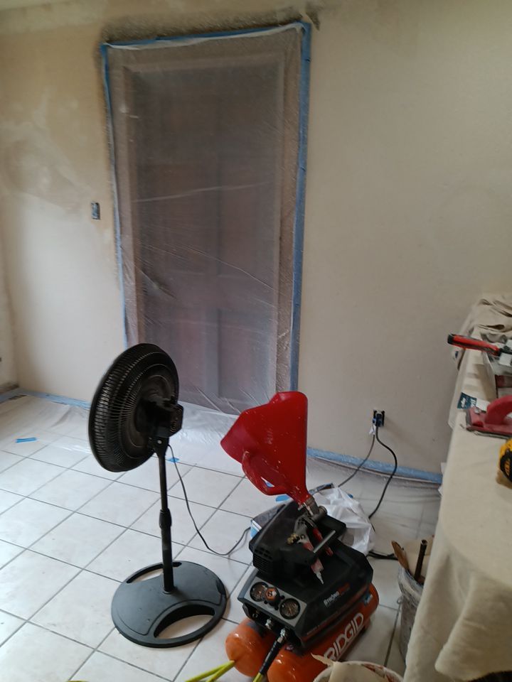 Interior and exterior painting project by Roof Concepts Construction
