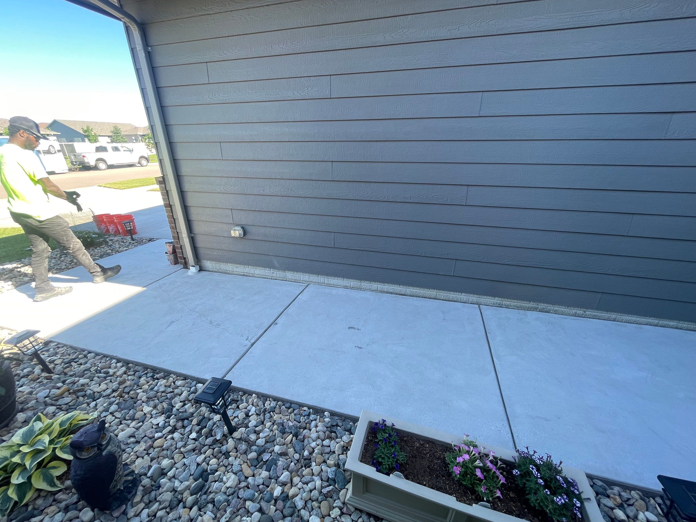 Custom Concrete Coating for Sioux Falls Patio and Front Walkway by Select Painting, Coatings & Garage Cabinets