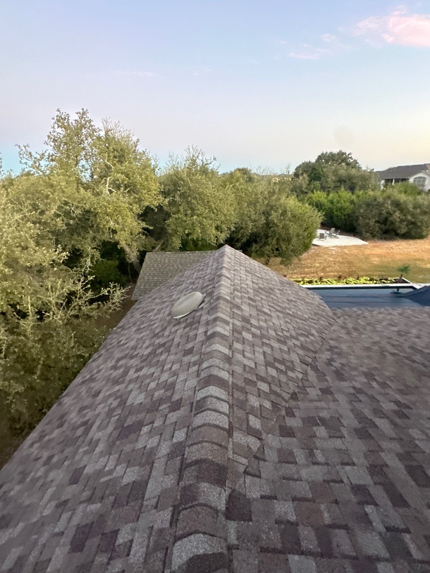 Hail Damage Roof Replacement & Gutter Upgrade in Leander, TX by Cool Roofs