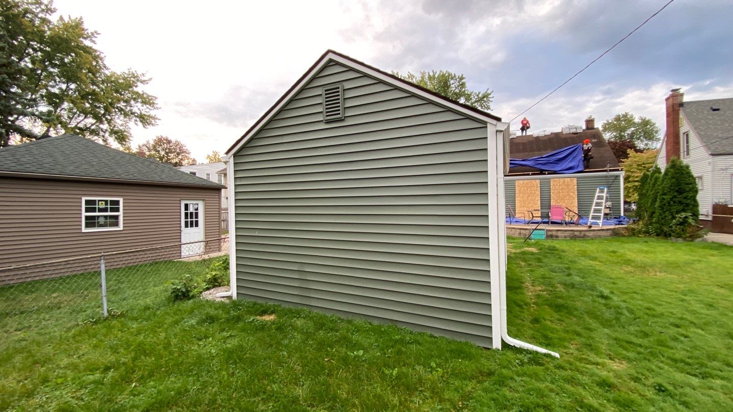 Siding Replacement using CertainTeed Restoration Classic D5 Forest Green by 180 Contractors