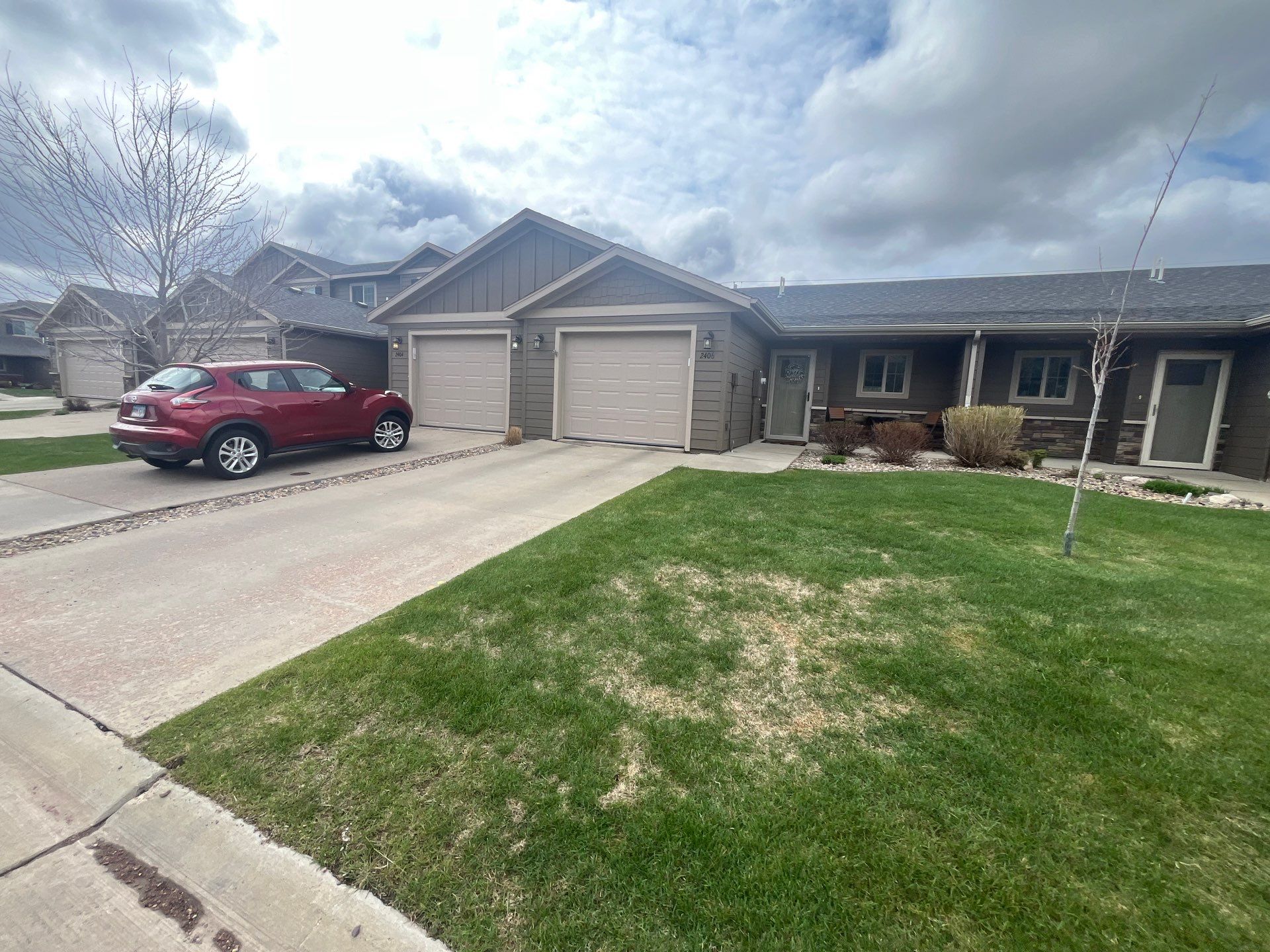 Exterior Painting for Multi-Unit Townhomes in Sioux Falls by Select Painting, Coatings & Garage Cabinets