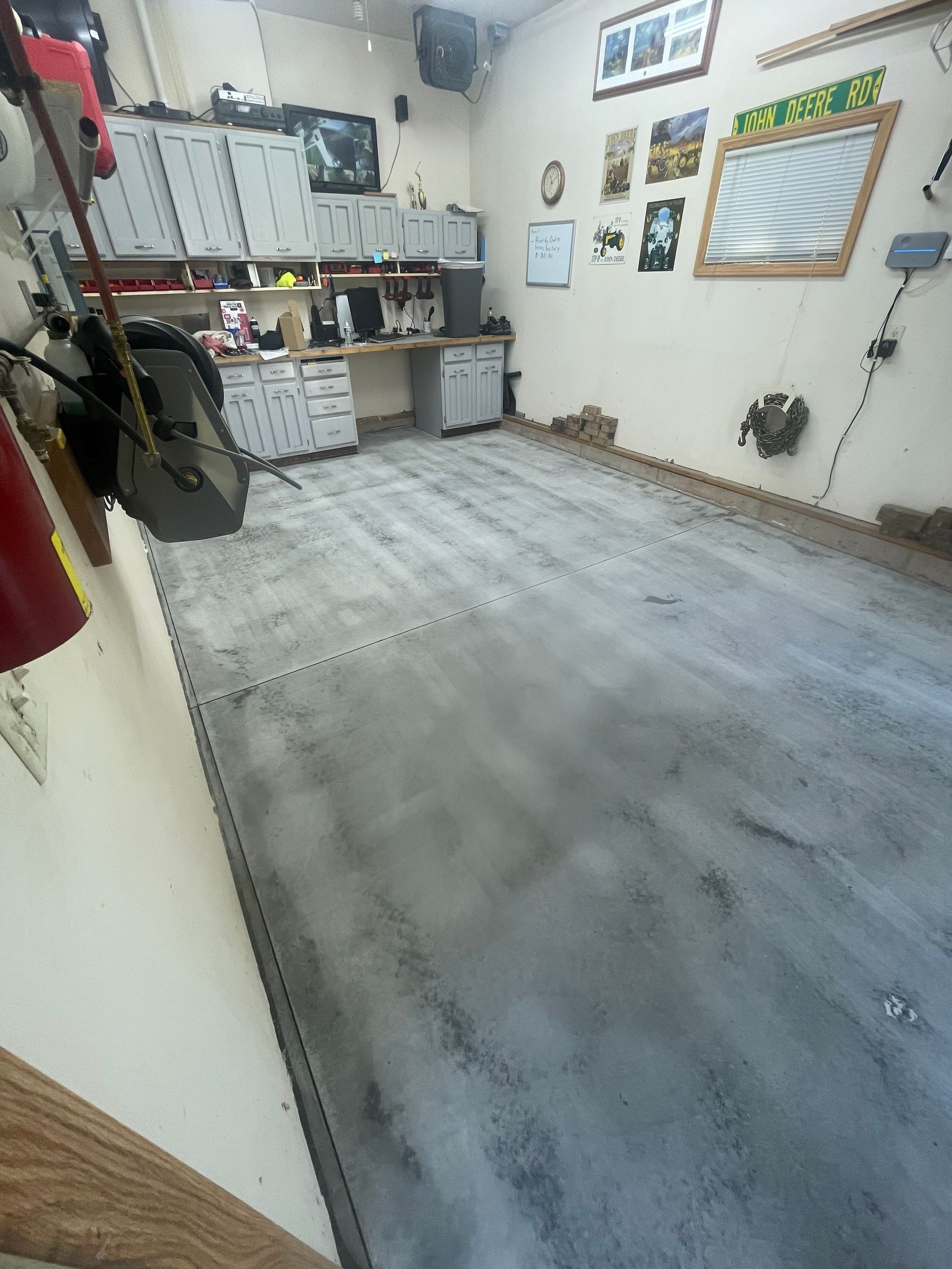 Multi-Stall Garage Floor Coating Installation in Sioux Falls by Select Painting, Coatings & Garage Cabinets