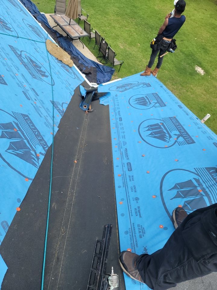 Residential Roofing Installation using Roof Replacement by American Roofing & Construction LLC